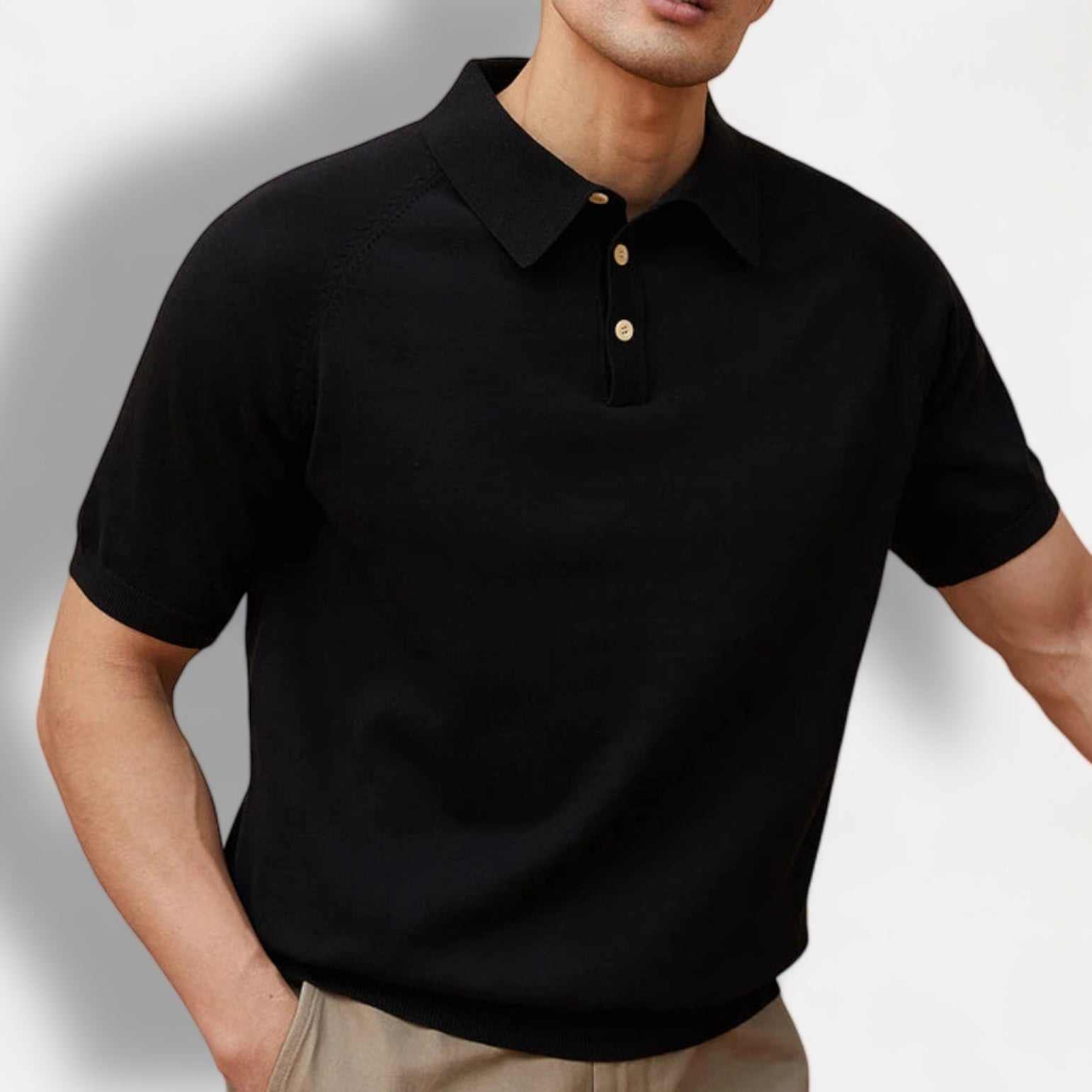Luxury knitted polo t-shirt in solid black, ideal for casual and business style.