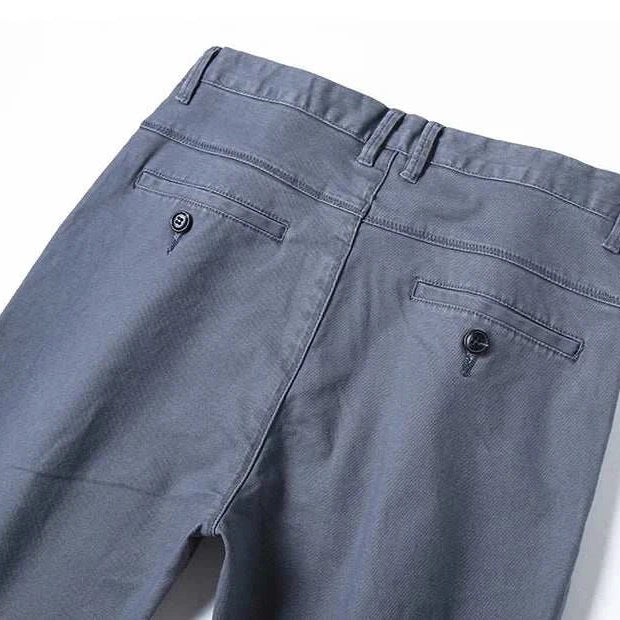 Cotton straight chino pants with back pockets in gray.