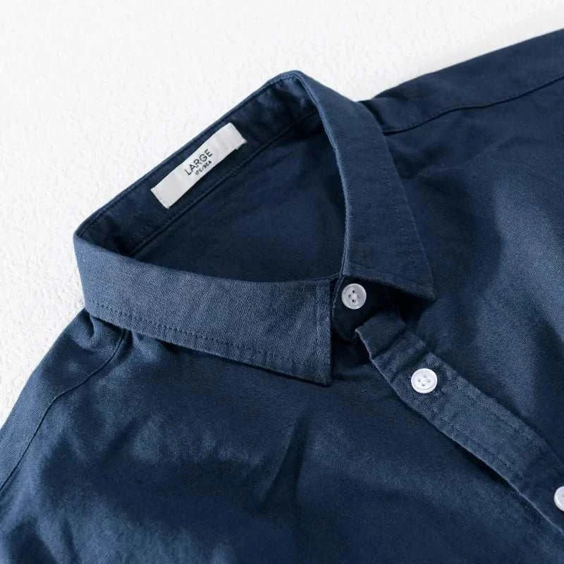 Navy blue summer casual long-sleeve shirt for men, breathable linen-cotton blend.