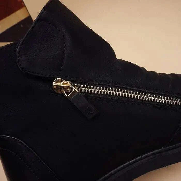 Fashion leather Chelsea boot with convenient side zipper detail.