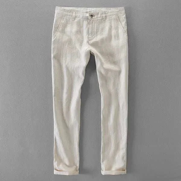 Linen casual pants in light color on a gray background