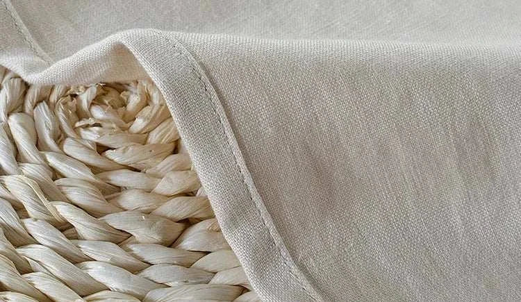 Beige linen fabric close-up, ideal for casual pants.