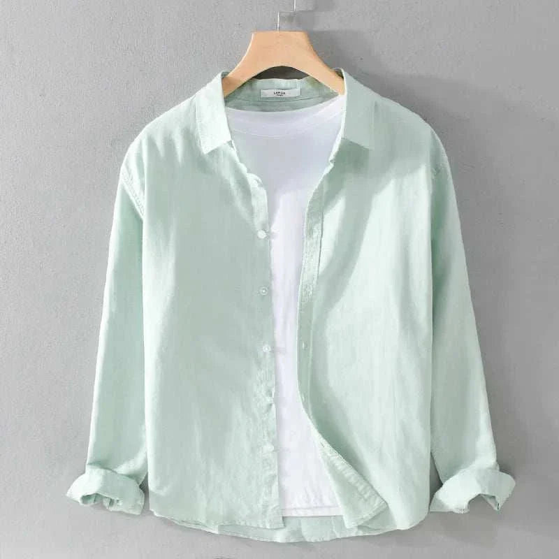 Summer casual long-sleeve shirt in light fabric on a hanger.