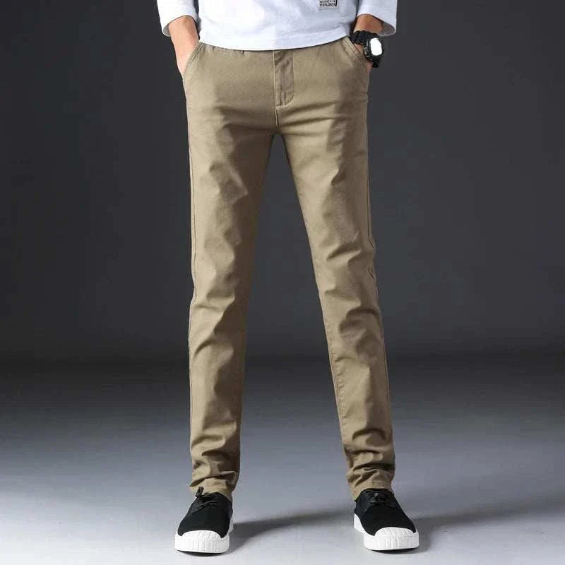 Cotton straight chino pants in khaki, relaxed fit, lightweight cotton-spandex blend.