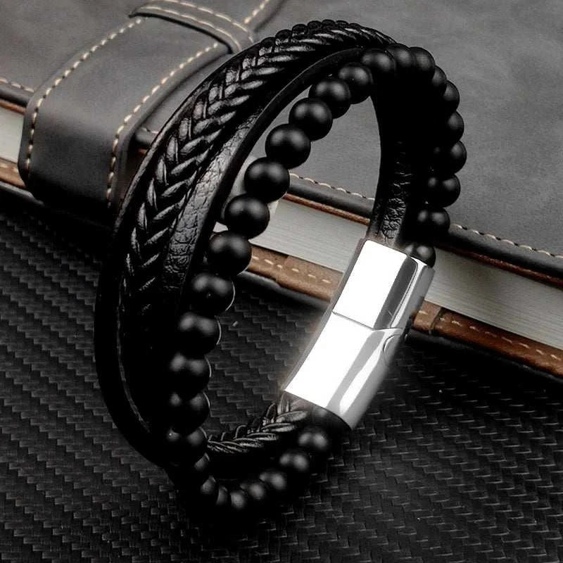 Stainless steel stone bracelet with black PU material and metal clasp.
