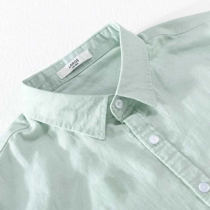 Summer casual long-sleeve shirt in light green, linen-cotton blend, solid pattern.