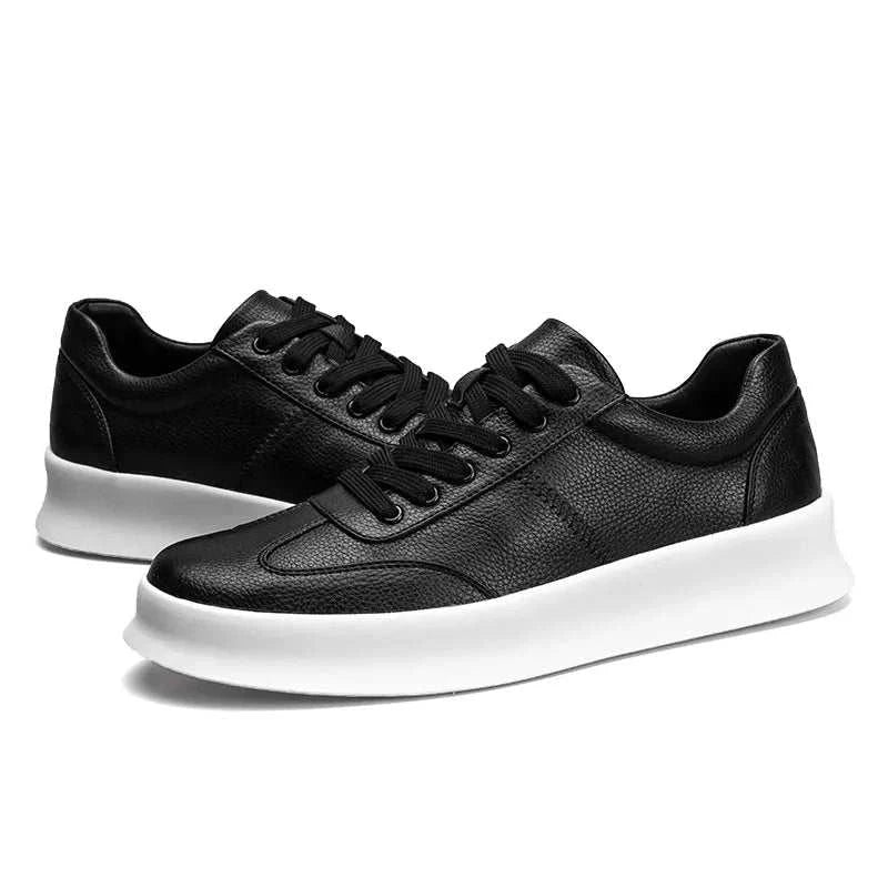 Black student leather casual shoes with white soles, made from genuine cow leather for comfort and style.