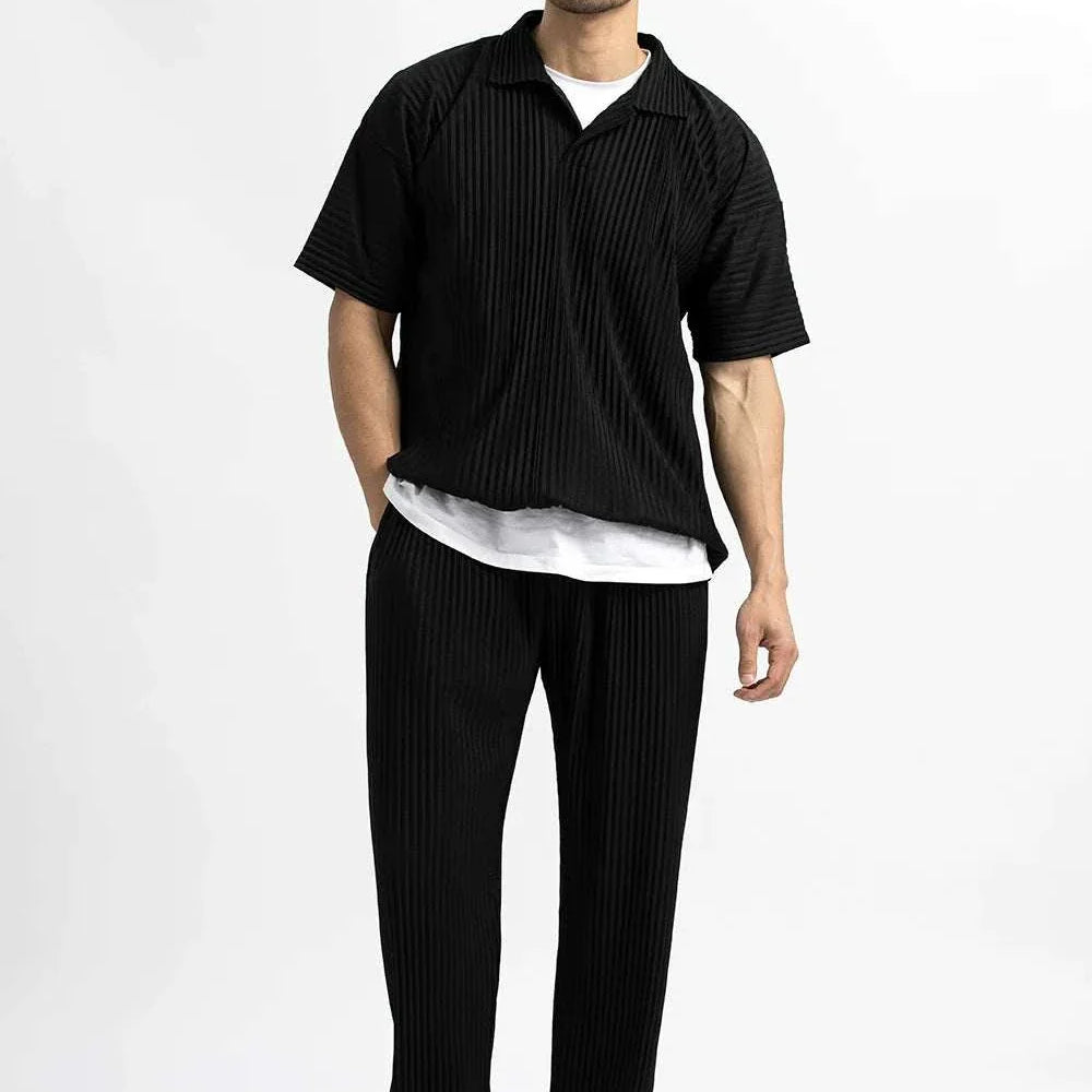 Baggy relaxed fit casual trousers for men in black, featuring a loose and comfortable style.