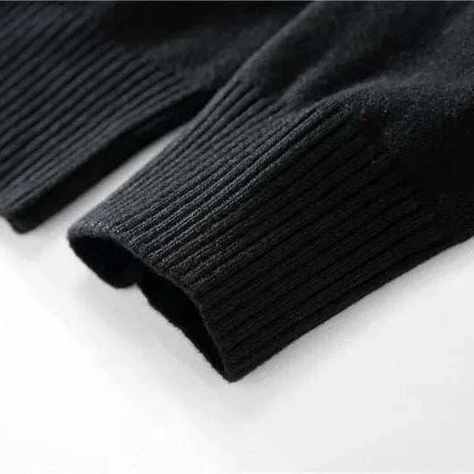 Black cotton cold season casual cardigan sleeve cuffs.