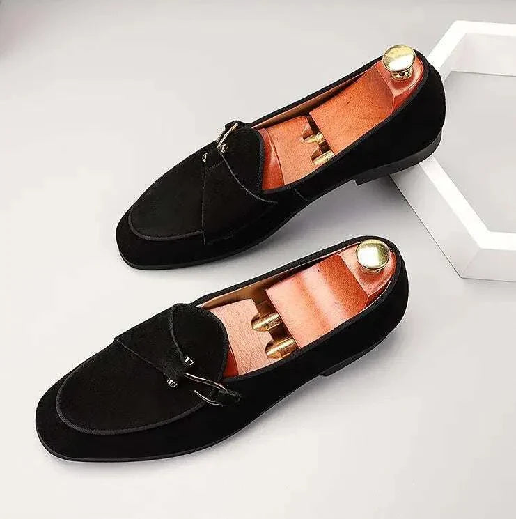 Elegant suede leather loafers in black for men, featuring breathable design and cushioned insole.