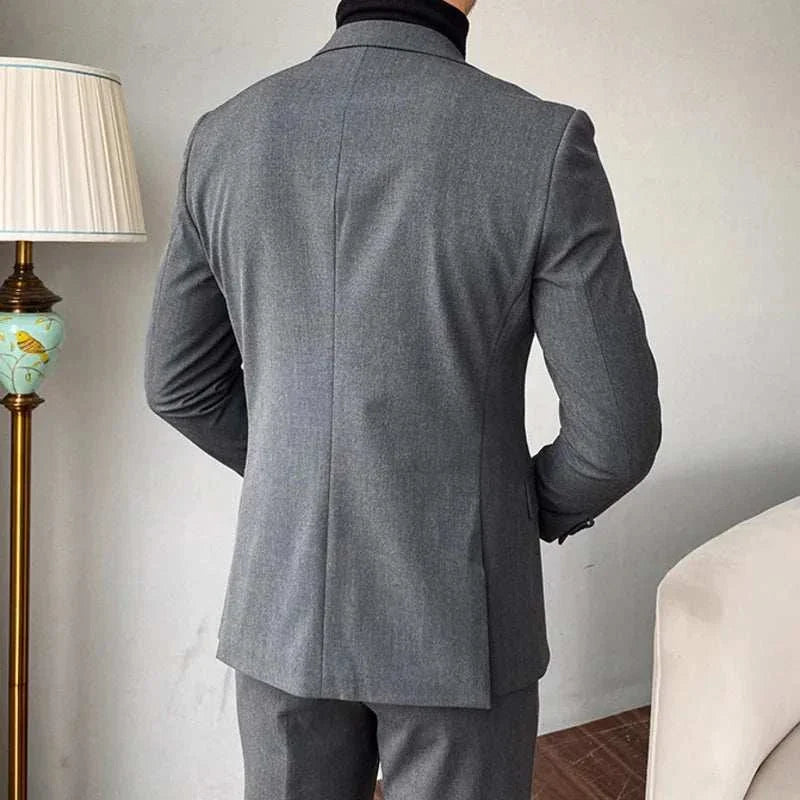 Elegant premium gray suit showcasing blazer and pants for formal occasions.