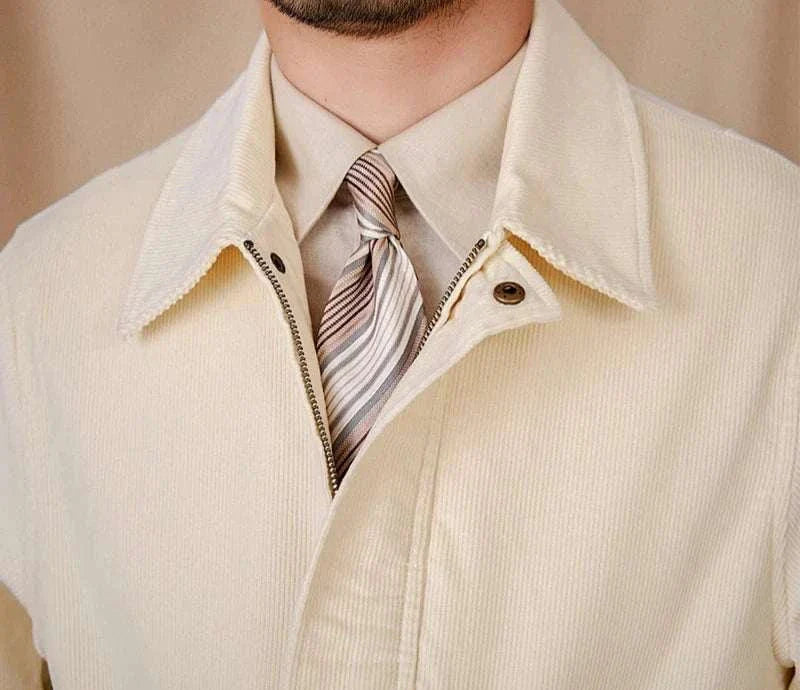 Pure cotton bomber jacket in cream, featuring a collar and zip-up front.