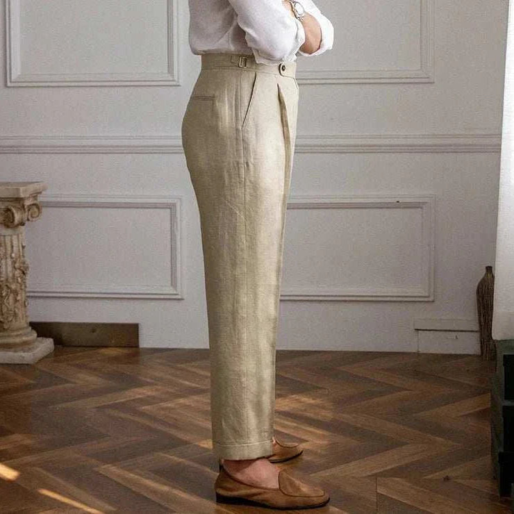 Lightweight Italian high-waist linen trousers for men in a stylish casual setting.