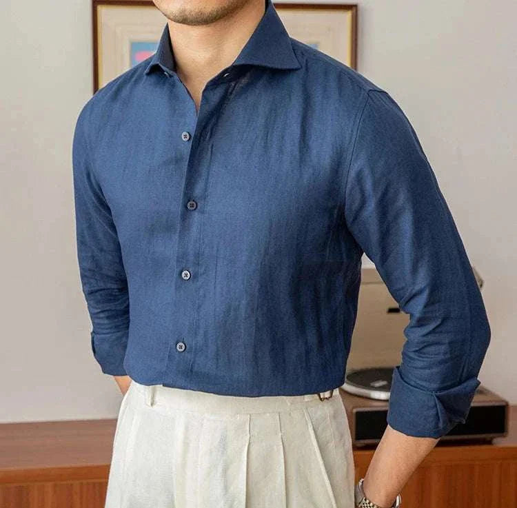Lightweight linen long-sleeve shirt in blue worn by a man.