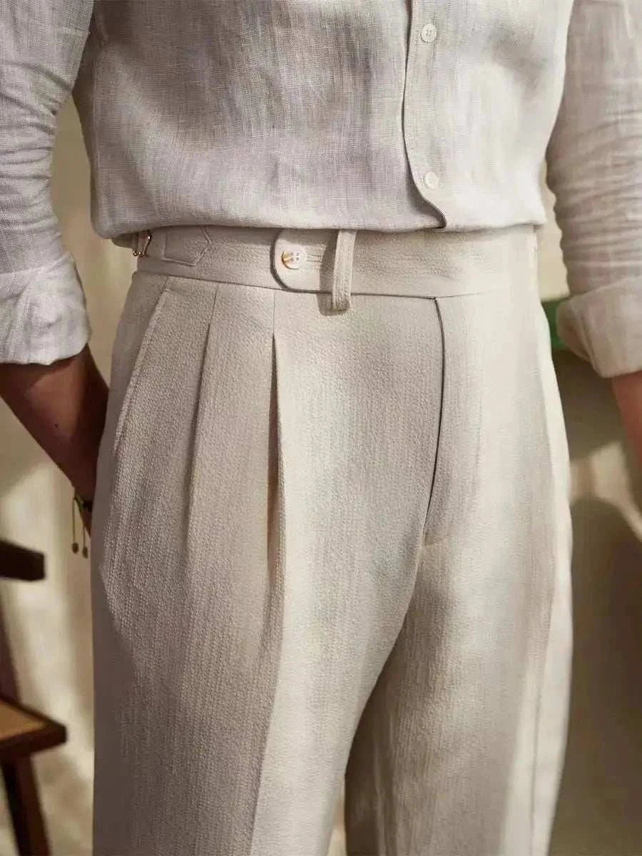 High-waist belt design trousers in luxurious viscose, offering a comfortable and elegant fit.