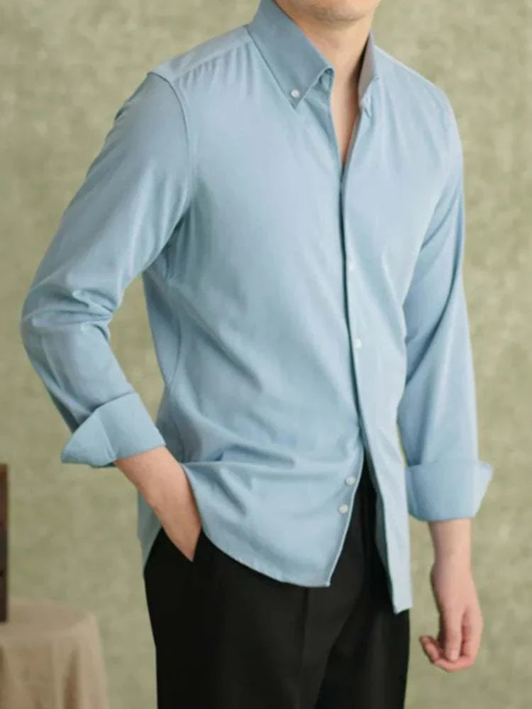 Men's spring pointer collar long sleeve shirt in light blue.