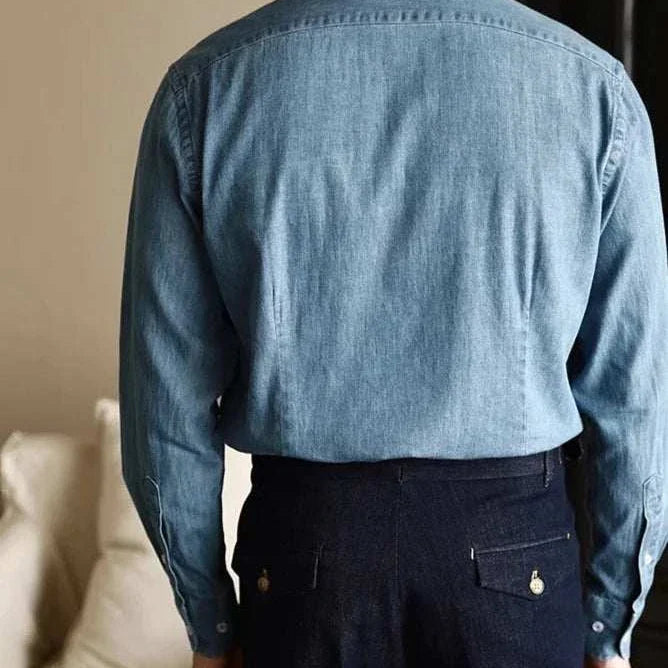 Office premium denim shirt in soft, breathable fabric with classic collar, perfect for casual or elegant styles.