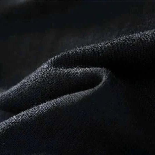 Cold season casual cardigan fabric close-up showing cotton texture.