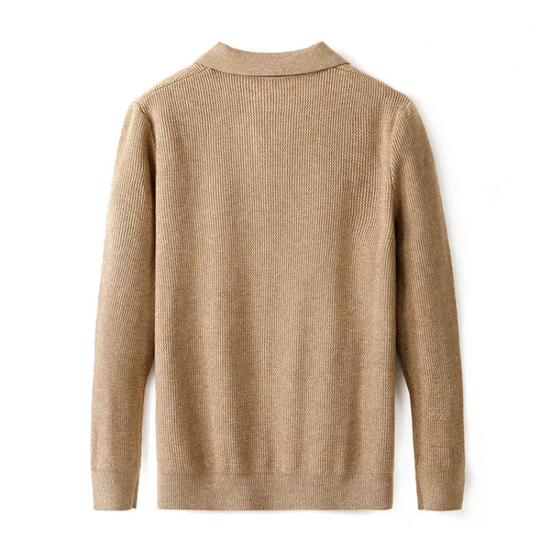 A beige ribbed knit sweater shown from the back, featuring a mock neck collar and long sleeves, photographed against a clean white background.