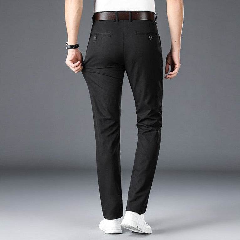 Men wearing Antonios Stretch Pants in black, showcasing full-length casual style.