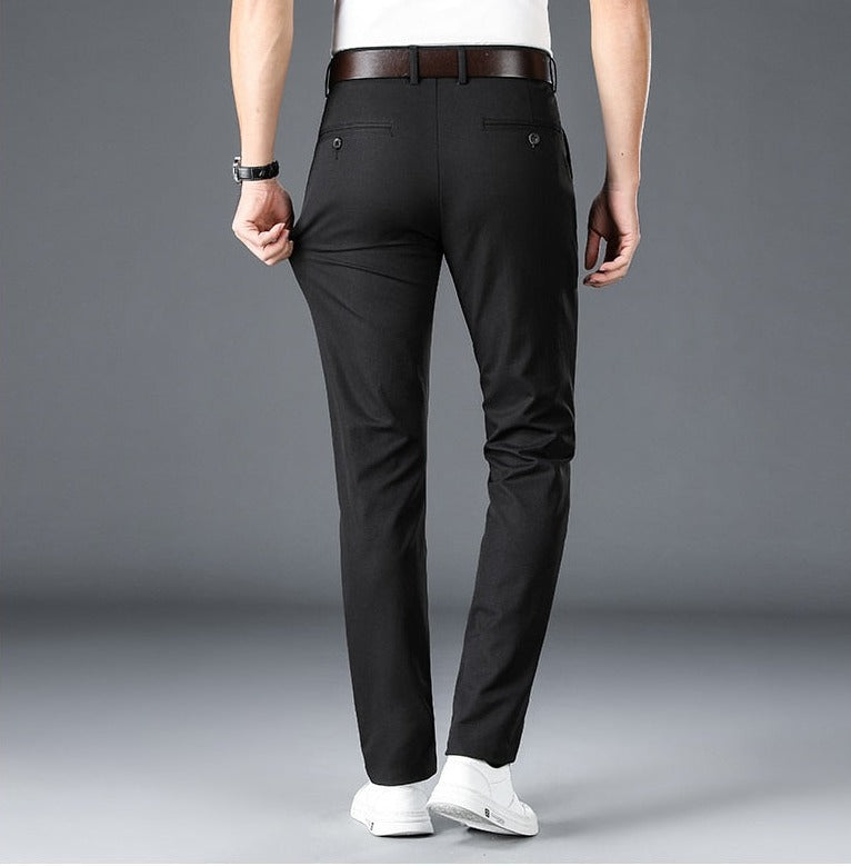 Men wearing Antonios Stretch Pants in black, showcasing full-length casual style.
