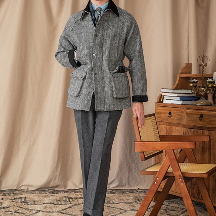 Man wearing wool heavy vintage coat in stylish setting.