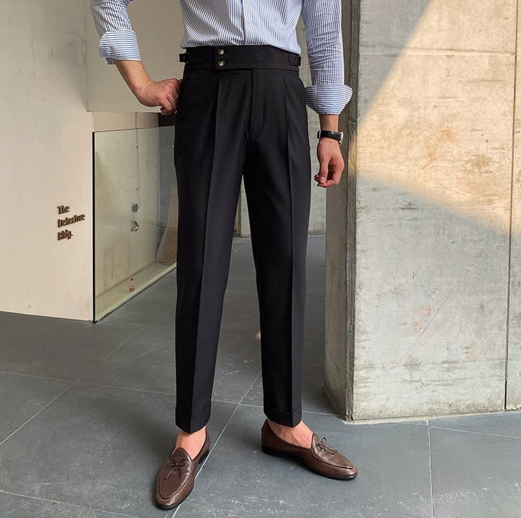 High Waist Trousers in black cotton for men, styled casually for elegant occasions.