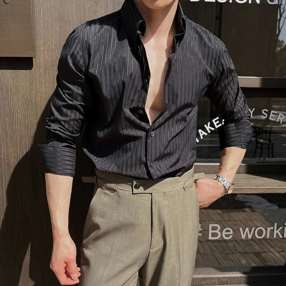 Slim-fit pointed collar striped shirt for men with button-up style.