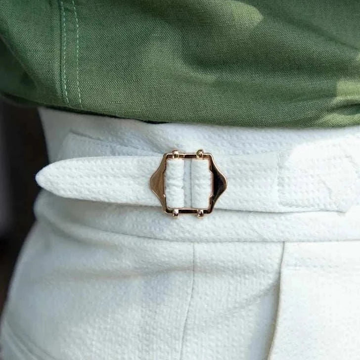 Italian design office high-waist trousers with buckle detail.