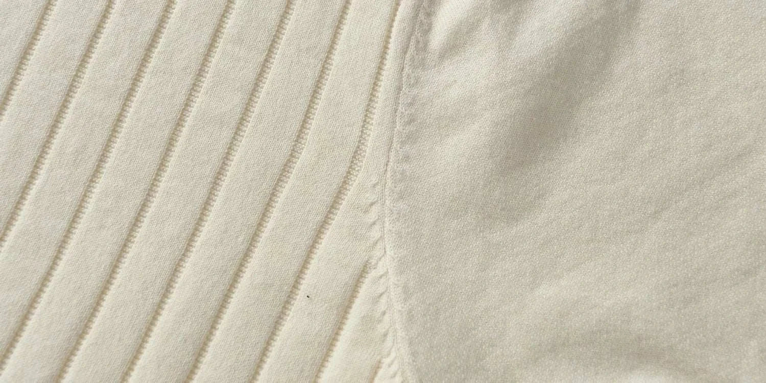 Close-up of fabric texture from vintage business cotton summer t-shirt.