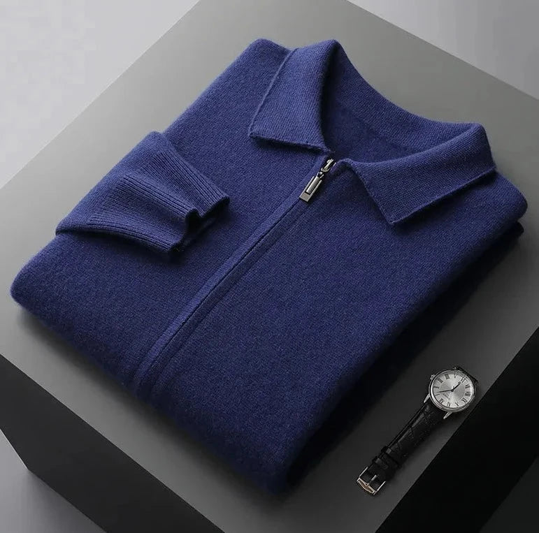 Blue Antonios Cashmere Cardigan folded with a silver watch nearby on a dark surface.