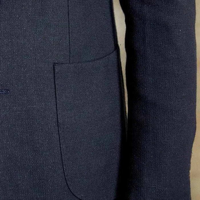 Slim fit cotton-linen blend jacket with sleek pocket design.