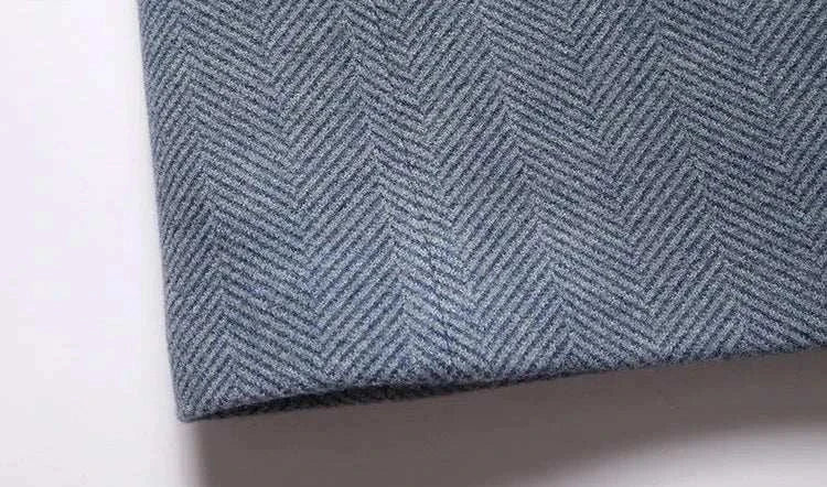 Business casual Korean coat fabric detail in herringbone pattern, polyester-wool blend.