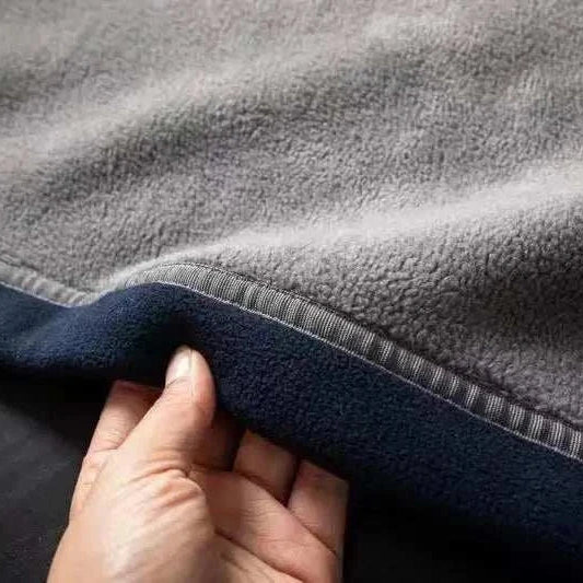 Close-up of Norway puffer jacket fabric, showcasing its soft and warm texture.