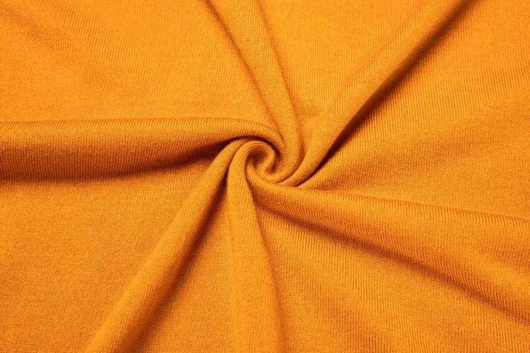 Close-up of luxurious wool and viscose fabric for Antonios business polo premium sweater.