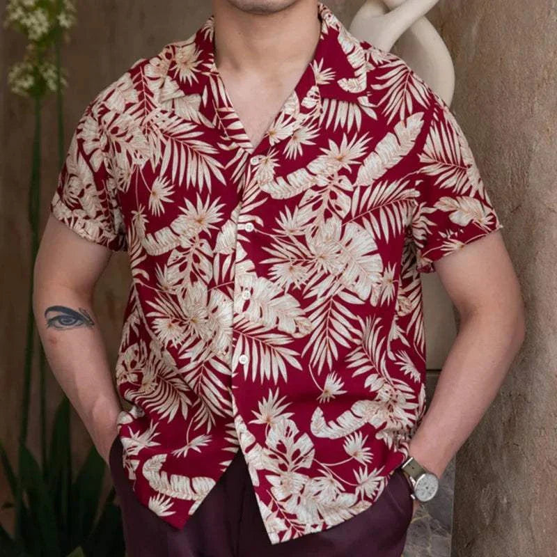 Vintage Hawaiian flower shirt with red and beige floral pattern, casual men's summer attire.