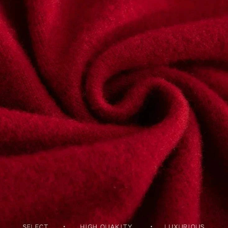 Luxurious red wool fabric close-up showcasing business wool turtleneck sweater quality.