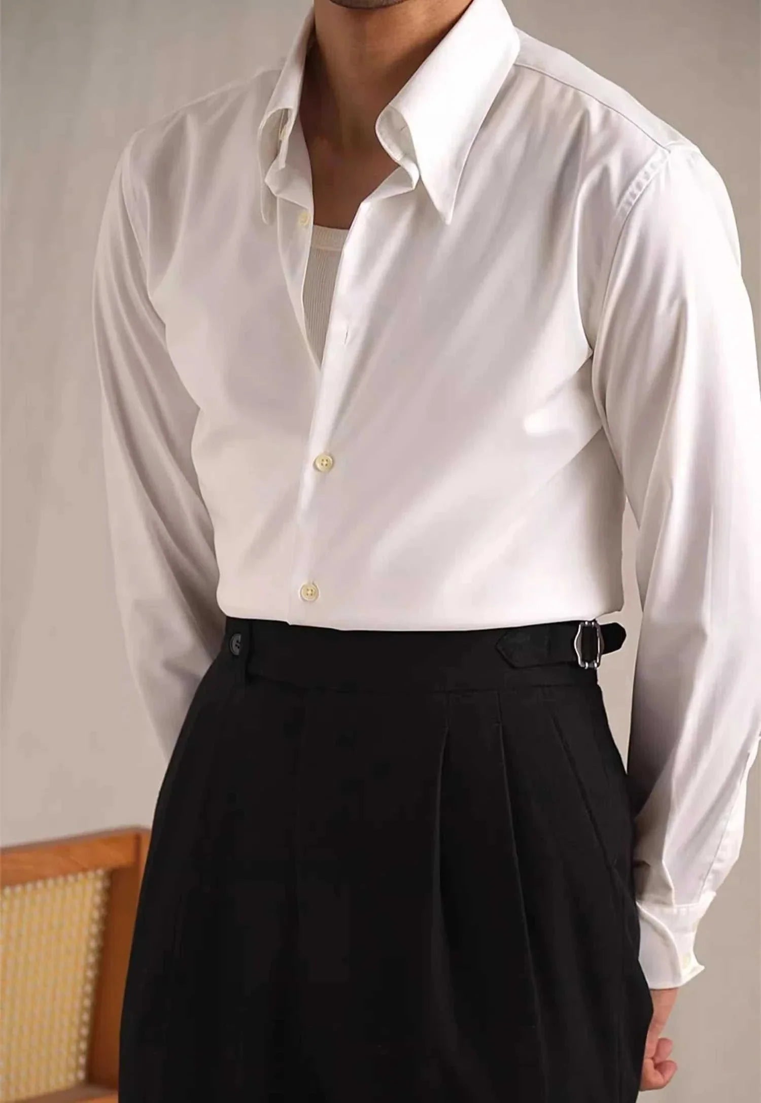Elegant white party tuxedo long sleeve shirt for men with sleek design, made from 100% polyester.