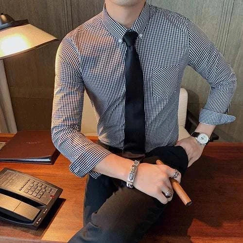 Cotton long sleeve plaid shirt worn by a man in an office setting, offering a stylish and comfortable look.