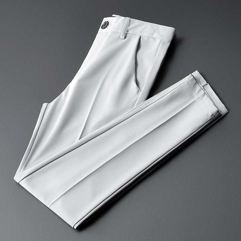Vinny Office Pants in elegant white wrinkle-resistant polyester, showcasing classic tailoring and refined style.