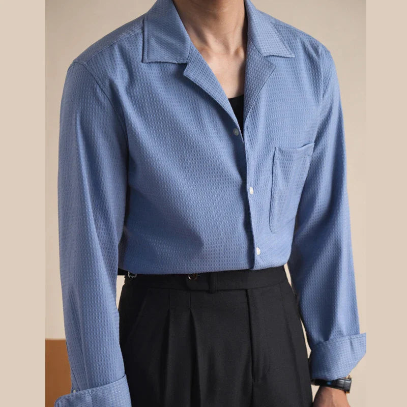 Vintage tailored collar old money shirt in blue cotton fabric, long sleeves, men's classic Italian style.
