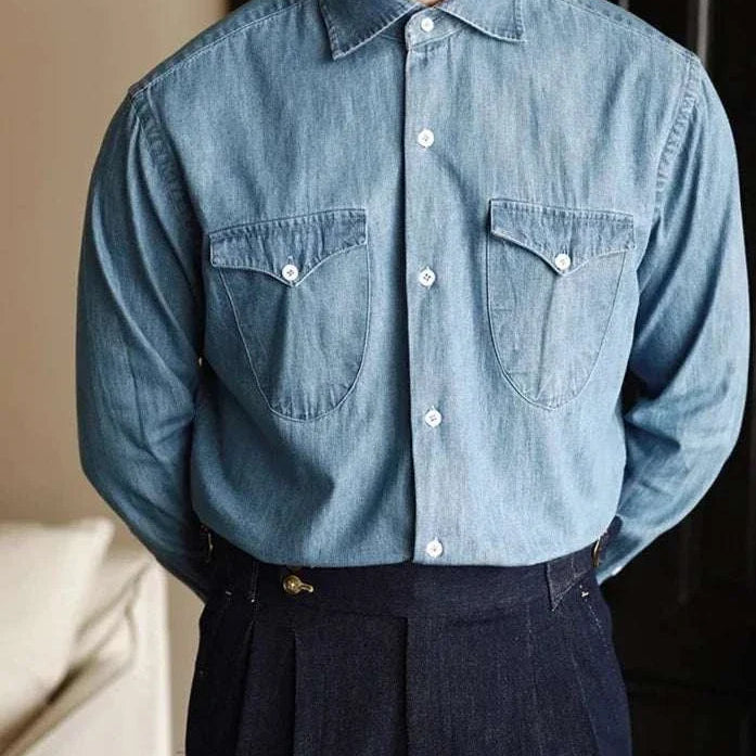 Office premium denim shirt for men with classic collar and solid pattern, suitable for casual and elegant styles.