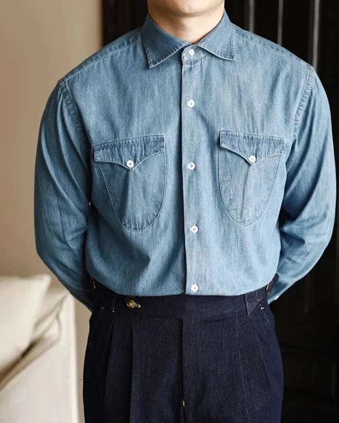 Office premium denim shirt for men with classic collar and solid pattern, suitable for casual and elegant styles.