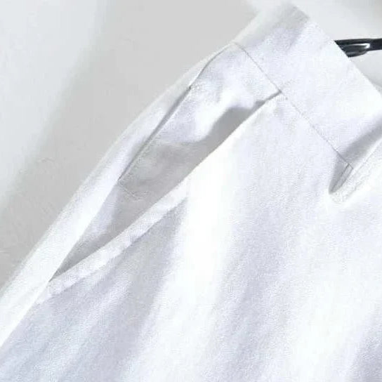 Linen straight oversize trousers in white, perfect for smart casual style.