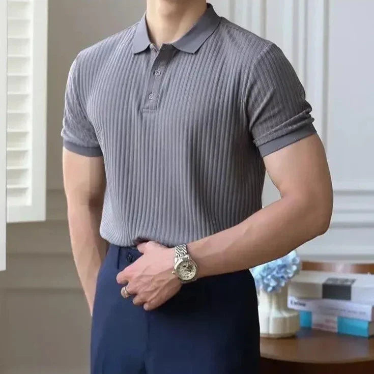 LUXELY vintage t-shirt on a man, featuring a striped design in organic cotton, styled for casual wear.