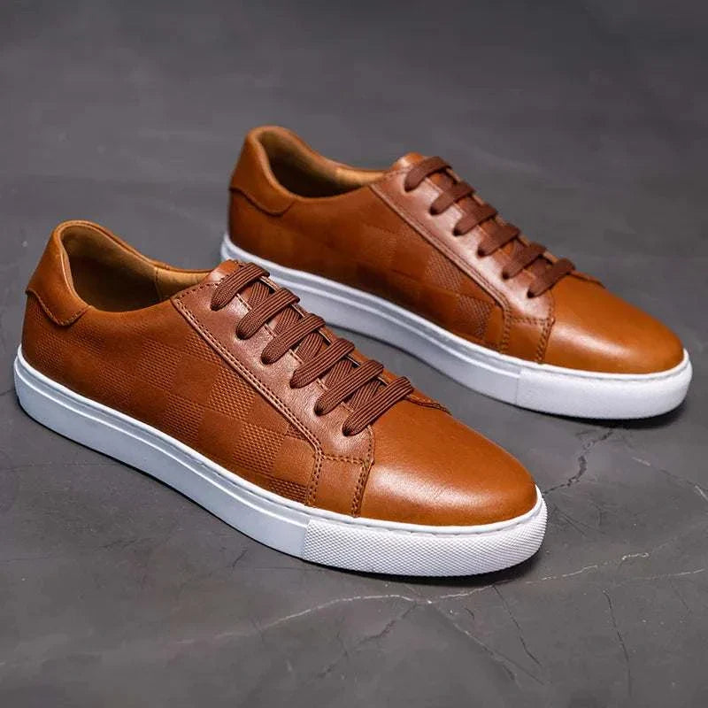 OXFY casual men's shoes in brown, offering comfort and style for any occasion.