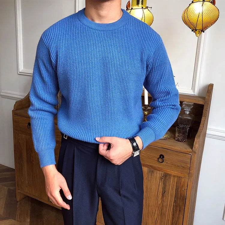 Antonios solid round neck knit sweater in blue.