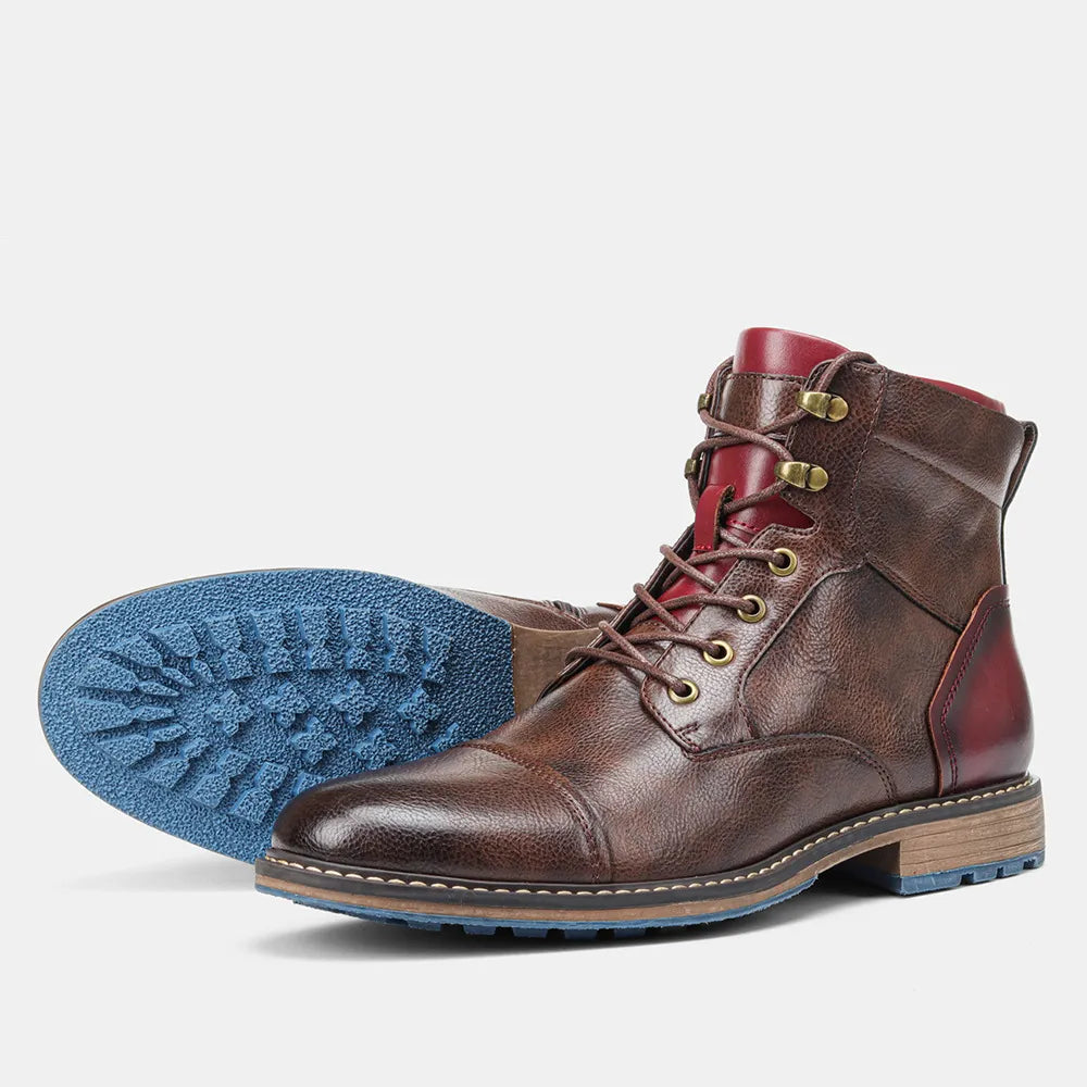 Brown ANT ankle boots with blue sole, rubber material, classic and minimalist design.