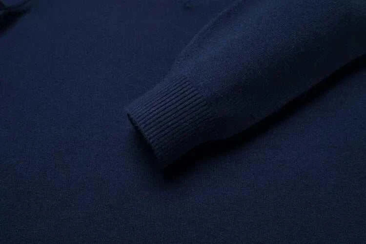 Antonios polo sweater with buttons, navy blue, close-up of sleeve ribbing.