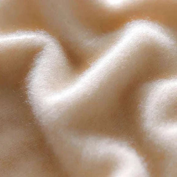 Luxurious wool texture of cold season pure wool sweater.